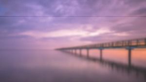 Efek jembatan blur ungu latar belakang PPT