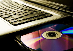 كمبيوتر محمول المفتوحة DVD القرص قالب باور بوينت